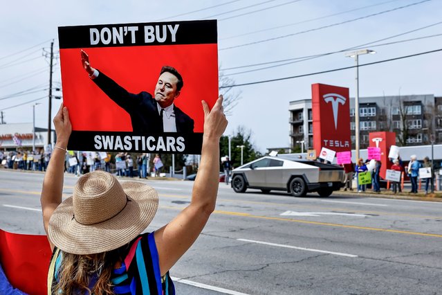 A Cybertruck arrives as demonstrators gather outside a Tesla dealership to protest businessman Elon Musk's current role in US President Donald Trump's administration in Decatur, Georgia, USA, 08 March 2025. Musk is leading the Department of Government Efficiency (DOGE) and has come under criticism for wide-scale government layoffs and downsizing. (Photo by Erik S. Lesser/EPA)