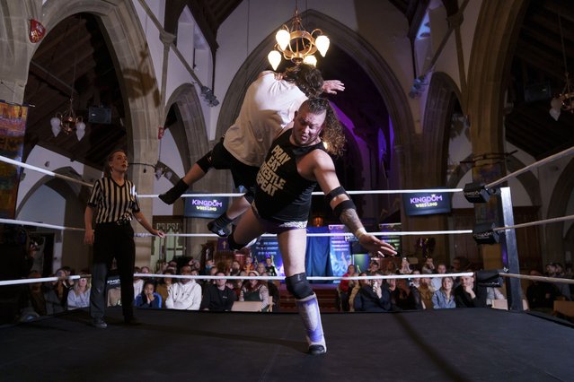 Gareth “Angel” Thompson body slams Young Johnty during a Kingdom Wrestling show at St Peter's Church in Shipley, Saturday, March 29, 2025. (Photo by Jon Super/AP Photo)