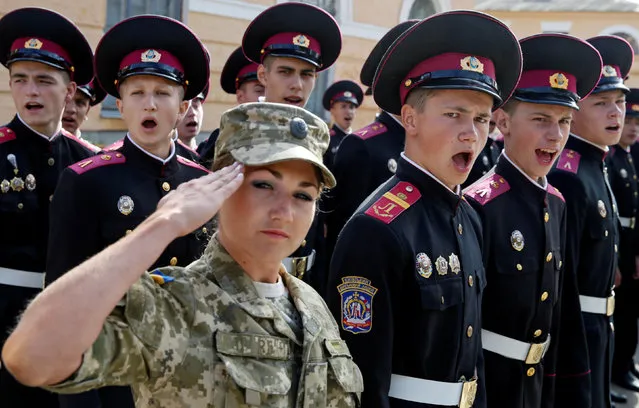 Students of a cadet lyceum attend a ceremony to mark the start of a new school year in Kiev, Ukraine September 1, 2016. (Photo by Valentyn Ogirenko/Reuters)