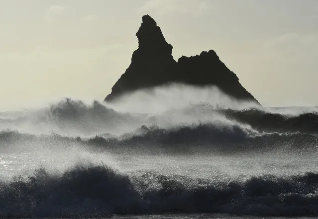 Gale force winds blow back the waves at Church Rock on Broad Haven Beach in Pembrokeshire, Wales, Britain, February 23, 2017. (Photo by Rebecca Naden/Reuters)