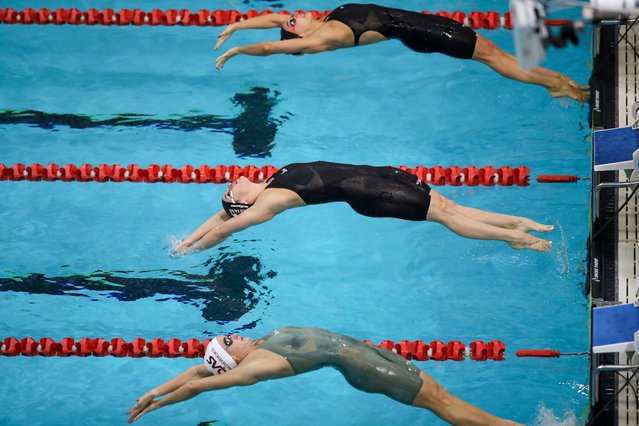 Competitors start a women’s 200-metre backstroke race during world championship trials in Adelaide, Australia on June 11, 2025. (Photo by Matt Turner/AAP Photo)