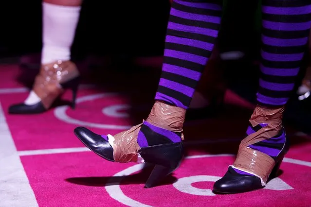 Contestants prepare to start in a high heels race in Paris, France, October 15, 2015. (Photo by Charles Platiau/Reuters)