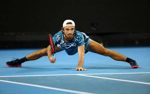 Czech Republic's Tomas Machac in action against Norway's Casper Ruud during their men's singles match on day two of the Australian Open tennis tournament in Melbourne on January 17, 2023. (Photo by Hannah Mckay/Reuters)