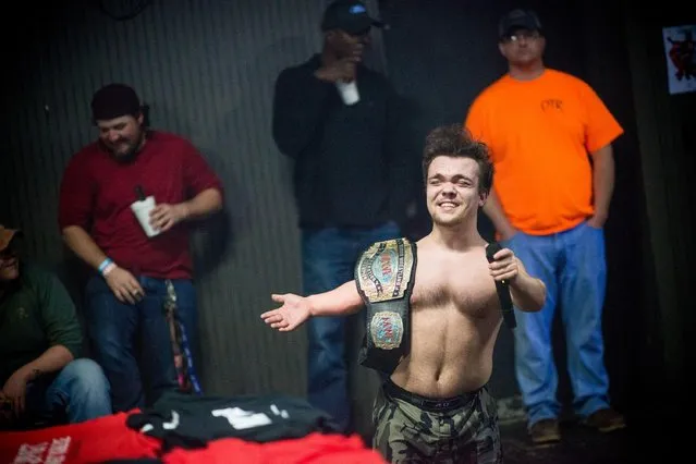Flyin' Ryan plays the villain to amp the crowd up for a rematch for the title belt that he won by “cheating” at On The Rocks in Cleveland, Ms., on February 9, 2018. (Photo by Emily Kask/AFP Photo)