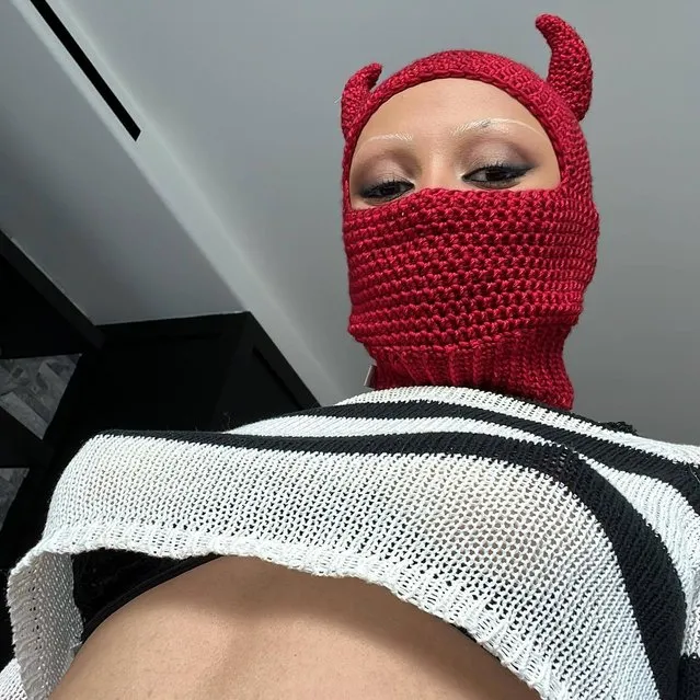American rapper Amala Ratna Zandile Dlamini, known professionally as Doja Cat in the last decade of February 2023 tempts followers with a selfie in a devil-inspired face cover. (Photo by dojacat/Instagram)