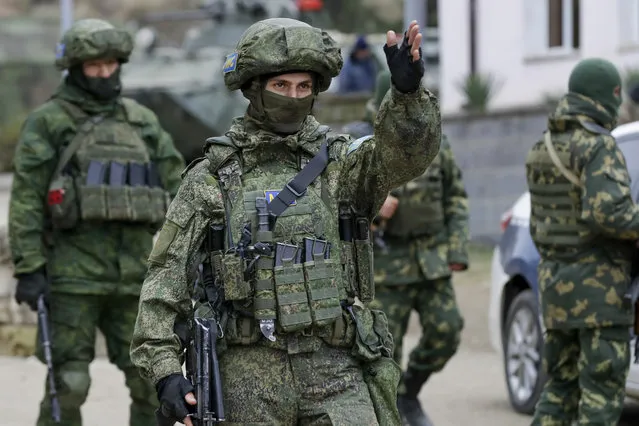 Russian peacekeepers patrol an aria in Stepanakert, the separatist region of Nagorno-Karabakh, on Sunday, November 15, 2020. (Photo by Sergei Grits/AP Photo)