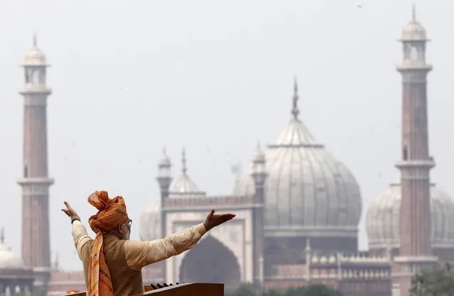 Indian Prime Minister Narendra Modi addresses the nation from the historic Red Fort during Independence Day celebrations in Delhi, India, in this August 15, 2015 file photo. Modi pledged 800 billion rupees ($12.10 billion) in funds to bolster development and economic growth in Kashmir, a year after the worst flooding in more than a century destroyed half a million homes there. (Photo by Adnan Abidi/Reuters)