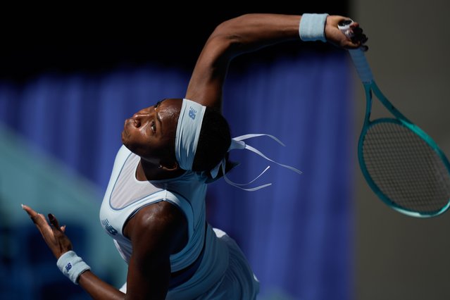 Coco Gauff of the United States serve against Belinda Bencic of Switzerland during a women's singles match of the China Open tennis tournament, in Beijing, China, Tuesday, September 30, 2025. (Photo by Mahesh Kumar A./AP Photo)