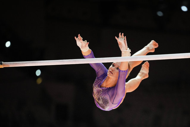 Individual Neutral Athlete Angelina Melnikova competes in the women's uneven bars final during the 53rd Artistic Gymnastics World Championships in Jakarta, Indonesia, Friday, October 24, 2025. (Photo by Dita Alangkara/AP Photo)