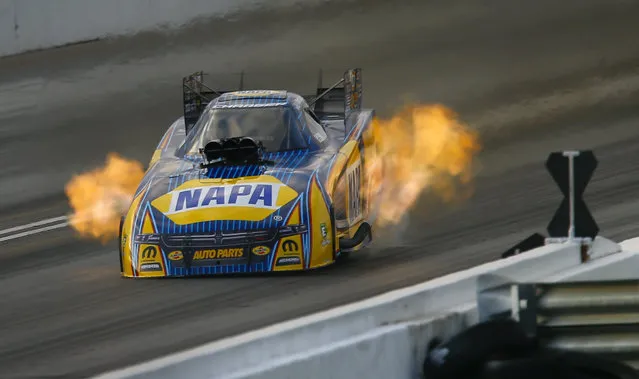 Funny Car driver Ron Capps races to the finish line during his second qualifying run at the Menards NHRA Heartland Nationals drag races Friday, May 18, 2018, at Heartland Motorsports Park in Topeka, Kan. (Photo by Chris Neal/The Capital-Journal via AP Photo)