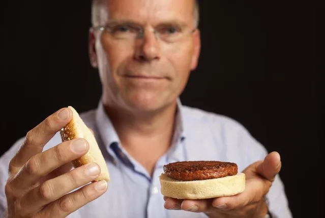 In this handout image provided by Ogilvy, a burger made from cultured beef, which has been developed by Professor Mark Post of Maastricht University in the Netherlands (pictured) is shown to the media during a press conference on August 5, 2013 in London, England. Cultured Beef could help solve the coming food crisis and combat climate change with commercial production of Cultured Beef beginning within ten to twenty years. (Photo by David Parry via Getty Images)