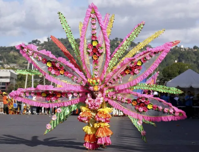 A reveller parades on stage at the annual Trinidad and Tobago Red Cross Society's Children's Carnival Competition at the Queen's Park Savannah in Port-Of-Spain February 7, 2015. (Photo by Andrea De Silva/Reuters)