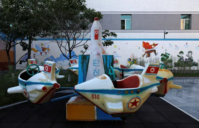 A swing in the form of a missile is seen at a kindergarten and day care for employees' children at a silk factory during a government organised visit for foreign reporters ahead of the 70th anniversary of North Korea's foundation in Pyongyang, North Korea on September 7, 2018. (Photo by Danish Siddiqui/Reuters)