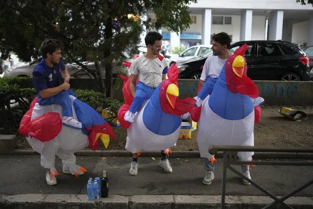 French rugby supporters arrive in fancy dress for the Rugby World Cup Pool A match between France and Namibia at the Stade de Marseille in Marseille, France, Thursday, September 21, 2023. (Photo by Daniel Cole/AP Photo)