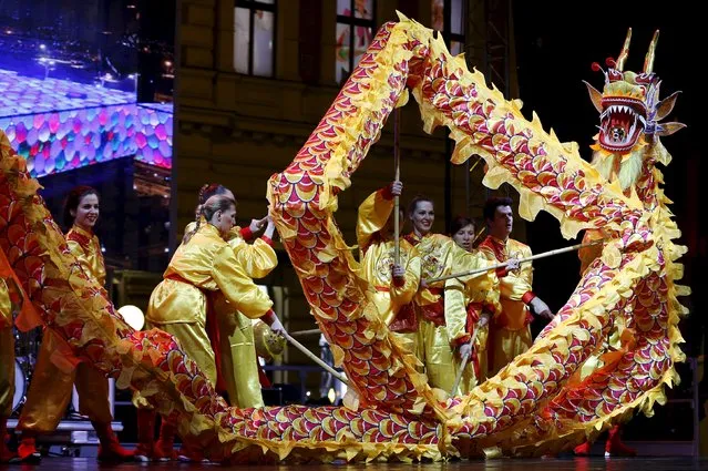 A dragon dance is performed during a celebration for the upcoming Chinese New Year at Zagreb's main square, Croatia, January 30, 2016.  REUTERS/Antonio Bronic 