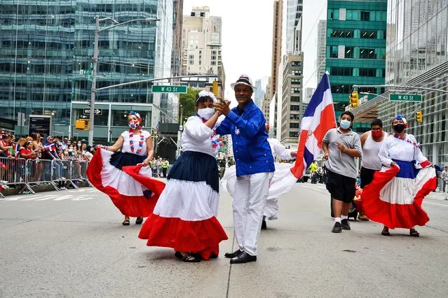 Performers march along Sixth Avenue during the annual Dominican Day parade on August 8, 2021 in New York City. (Photo by Ryan Rahman/Pacific Press/Rex Features/Shutterstock)