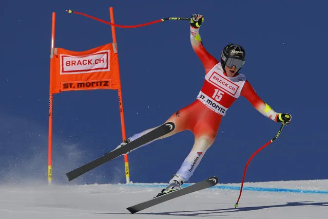 Switzerland's Lara Gut Behrami speeds down the course during an alpine ski, women's World Cup downhill training, in St. Moritz, Switzerland, Thursday, December 7, 2023. (Photo by Giovanni Pizzato/AP Photo)