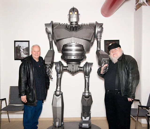 Writers Joe Lansdale and George R. R. Martin pose next to a movie prop robot prior to SundanceTV's “Hap & Leonard” Screening at the Jean Cocteau Theater on February 23, 2016 in Santa Fe, New Mexico. (Photo by Steve Snowden/Getty Images)