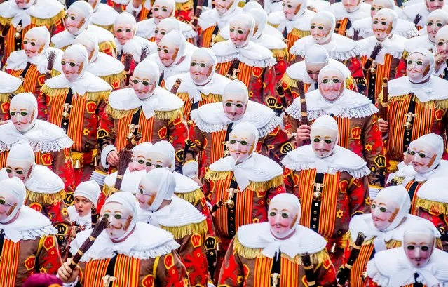 Festival participants known as Gilles wear traditional costumes during Carnival celebrations in the streets of Binche, Belgium, 28 February 2017. The Carnival de Binche is a popular historical cultural event that was named a Masterpiece of the Oral and Intangible Heritage of Humanity by UNESCO in 2003. (Photo by Stephanie Lecocq/EPA)