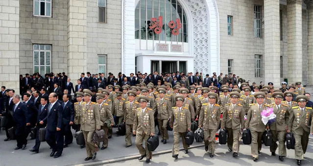 This picture taken and released by North Korea's official Korean Central News Agency (KCNA) on May 3, 2016 shows participants for the Seventh Congress of the Workers' Party of Korea (WPK) arriving in Pyongyang. After four years of top-level reshuffles, purges and executions, Kim Jong-Un will formally cement his unassailable status as North Korea's supreme leader at a landmark ruling party congress this week. (Photo by AFP Photo/KCNA)