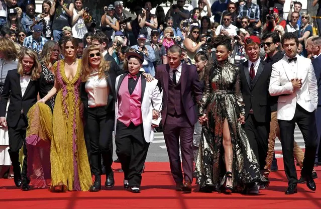 Director Andrea Arnold (3rdL) arrives on the red carpet with cast member Shia LaBeouf (R), Sasha Lane (3rdR), Riley Keough (2ndL), Veronica Ezell, (4thL), Raymond Coalson (2ndR), Isalah Stone (L) and Mccaul Lombardi (4thR) for the screening of  the film “American Honey” in competition at the 69th Cannes Film Festival in Cannes, France, May 15, 2016. (Photo by Eric Gaillard/Reuters)
