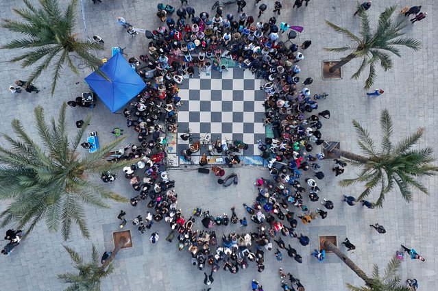 An aerial view taken with a drone shows the Italian, French, and Lebanese musicians performing at the seaside corniche in Beirut, Lebanon, 25 February 2024. Italian, French, and Lebanese musicians perform as part of a street event organized by the Al Bustan International Festival which runs between 21 February and 17 March 2024. (Photo by Wael Hamzeh/EPA)