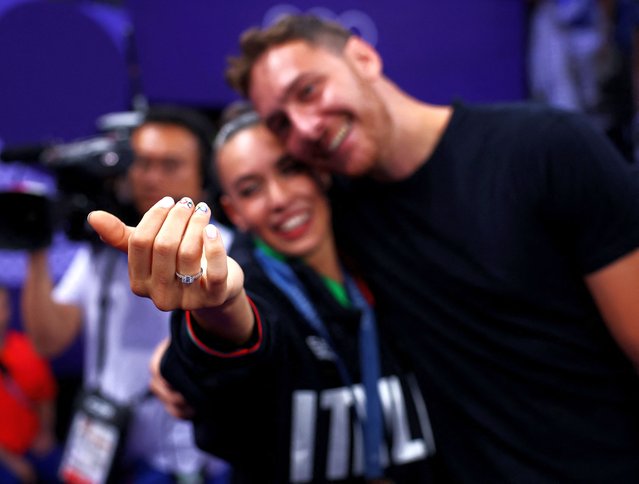 Bronze medallist Alessia Maurelli of Italy poses with her engagement ring after being proposed by her partner following the medal ceremony during the Paris 2024 Olympic Games at the Porte de la Chapelle Arena in Paris, on August 10, 2024. (Photo by Hannah Mckay/Reuters)