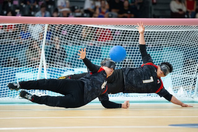 Naoki Hagiwara and Kazuya Kaneko of Team Japan compete during the Men's Semi-final match between Team People's Republic of China and Team Japan on day seven of the Paris 2024 Summer Paralympic Games at South Paris Arena on September 04, 2024 in Paris, France. (Photo by David Ramos/Getty Images)