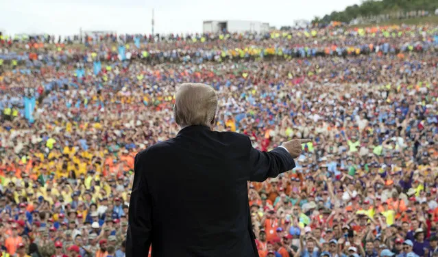 President Donald Trump gestures to the crowd after speaking at the 2017 National Scout Jamboree in Glen Jean, W.Va., Monday, July 24, 2017. (Photo by Carolyn Kaster/AP Photo)