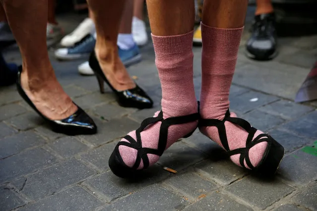 Competitors wait to take part in the annual race on high heels during Gay Pride celebrations in the quarter of Chueca in Madrid, Spain, June 30, 2016. (Photo by Susana Vera/Reuters)