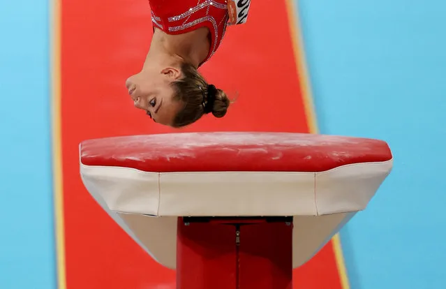 Canada's Laurie Denommee competes for second place and to take the silver medal in the women's vault final artistic gymnastics event at the Arena Birmingham, in Birmingham on day four of the Commonwealth Games in Birmingham, central England, on August 1, 2022. Laurie came second in the women’s vault final, behind Georgia Godwin of Australia. (Photo by Stoyan Nenov/Reuters)