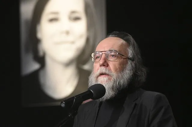 Philosopher Alexander Dugin speaks during the final farewell ceremony for his daughter Daria Dugina in Moscow, Russia, Tuesday, August 23, 2022. Daria Dugina, a 29-year-old commentator with a nationalist Russian TV channel, died when a remotely controlled explosive device planted in her SUV blew up on Saturday night as she was driving on the outskirts of Moscow, ripping the vehicle apart and killing her on the spot, authorities said. (Photo by Dmitry Serebryakov/AP Photo)