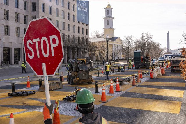 With the White House in the background, demolition begins on the Black Lives Matter mural, Monday, March 10, 2025, in Washington. (Photo by Jacquelyn Martin/AP Photo)