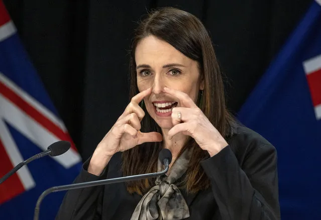 New Zealand Prime Minister Jacinda Ardern gestures during a press conference in Wellington, New Zealand, Wednesday, August 12, 2020. Authorities have found four cases of the coronavirus in one Auckland household from an unknown source, the first reported cases of local transmission in the country in 102 days. The news came as an unpleasant surprise and raised questions about whether the nation's general election would go ahead as planned next month. (Photo by Mark Mitchell/New Zealand Herald via AP Photo)