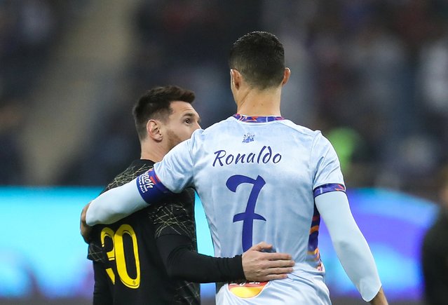 Lionel Messi (L) and Cristiano Ronaldo great each other prior Riyadh All-Star XI vs Paris Saint-Germain FC at King Fahd Stadium on January 19, 2023 in Riyadh, Saudi Arabia. (Photo by Power Sport Images/Rex Features/Shutterstock)
