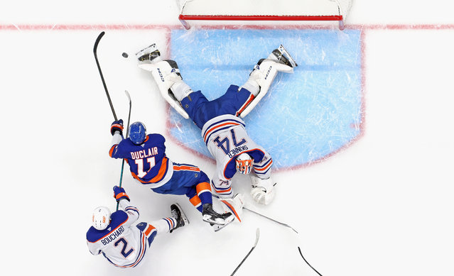 Stuart Skinner #74 of the Edmonton Oilers makes a save against Anthony Duclair #11 of the New York Islanders at UBS Arena on October 16, 2025 in Elmont, New York. The Islanders defeated the Oilers 4-2. (Photo by Bruce Bennett/Getty Images)