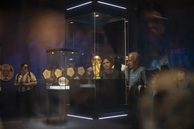 Original World Cup won by the Argentine team and other items related to 2022 FIFA World Cup Qatar is exhibited in Buenos Aires, Argentina on April 05, 2023. The official AFA exhibition in honor of the World Cup champions took place in Buenos Aires, Argentina. The event showcased the last cup won at the World Cup in Qatar and the other two cups won at the last World Cup. In addition, shirts worn by the national team players were shown, among other valuables. The Original World Cup won by the Argentine team in the 1978 World Cup is also exhibited. (Photo by Pablo Barrera/Anadolu Agency via Getty Images)