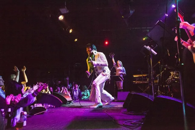 A contestant performs onstage during the 20th annual Seattle Invitationals, an amateur Elvis impersonator competition, in Seattle, Washington January 23, 2015. (Photo by David Ryder/Reuters)