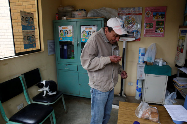 Francisco Verastegui, 56,  receives his medicine for multidrug-resistant tuberculosis at El Progreso Health Centre in Carabayllo in Lima, Peru July 14, 2016. (Photo by Mariana Bazo/Reuters)