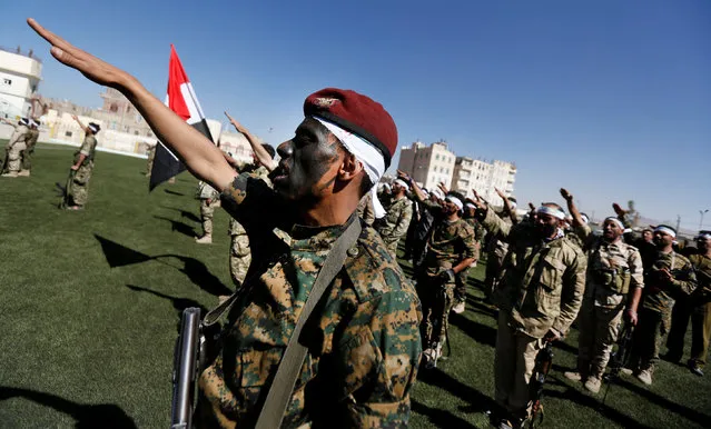 Newly recruited Houthi fighters take an oath as they parade before heading to the frontline to fight against government forces, in Sanaa, Yemen January 4, 2017. (Photo by Khaled Abdullah/Reuters)
