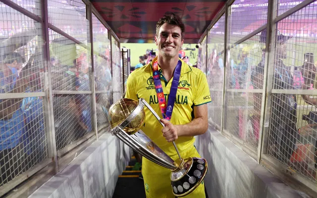 Pat Cummins of Australia poses with the ICC Men's Cricket World Cup Trophy following the ICC Men's Cricket World Cup India 2023 Final between India and Australia at Narendra Modi Stadium on November 19, 2023 in Ahmedabad, India. (Photo by Robert Cianflone/Getty Images)