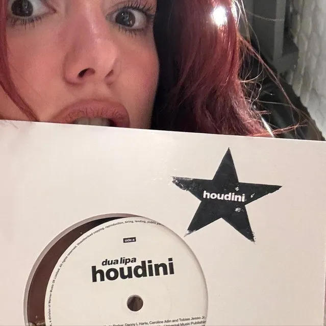 English-Albanian singer and songwriter Dua Lipa shows off her limited edition vinyl of “Houdini” in the second decade of December 2023. (Photo by dualipa/Instagram)
