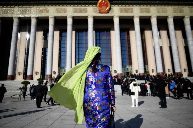 An ethnic minority delegate arrives for the third plenary meeting of the second session of the 13th National People's Congress (NPC) at the Great Hall of the People in Beijing on March 12, 2019. (Photo by Wang Zhao/AFP Photo)