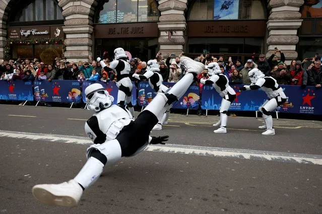 A performer dressed as a Stormtrooper break-dances during the London's New Year's Day Parade event in London, Britain on January 1, 2024. (Photo by Hollie Adams/Reuters)