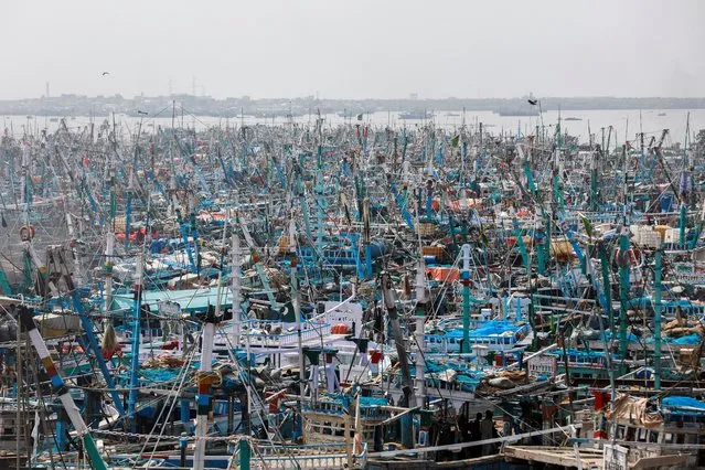 General view of anchored fishing boats after Pakistan Metrological Department website advised fishermen not to venture in the sea due to rough conditions following the cyclonic storm Gulab in the Arabian Sea, at Karachi Fish Harbour, in Karachi, Pakistan on September 29, 2021. (Photo by Akhtar Soomro/Reuters)