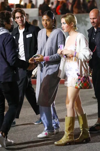 Kobe Bryant's daughter Natalia Bryant (L) and actress Iris Apatow enjoy a night out as they arrive at the Harry Styles concert with a friend in Los Angeles, CA. on November 18, 2021. (Photo by Backgrid USA)
