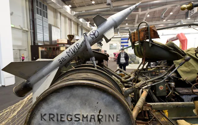 A rocket is seen on a giant so-called “Tank Bike”, driven by an engine of a T55 tank and constructed of former military equipment at a bike fair in Hamburg, Germany, February 24, 2017. (Photo by Fabian Bimmer/Reuters)