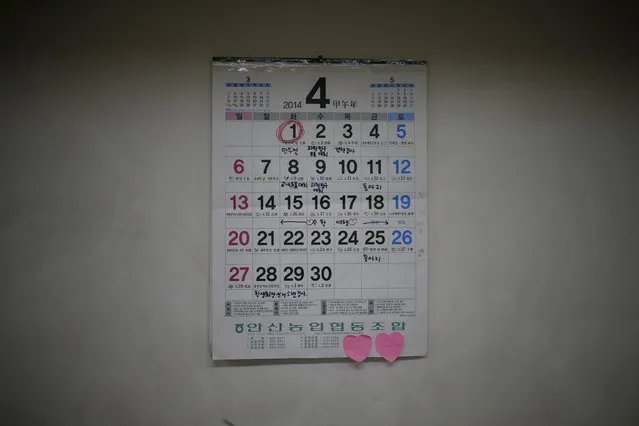 A period of a school trip (C) is marked on an April 2014 calendar used by victims who were onboard sunken ferry Sewol at an empty classroom, which was preserved since the disaster, at Danwon high school during the second anniversary of the disaster in Ansan, South Korea, April 16, 2016. (Photo by Kim Hong-Ji/Reuters)