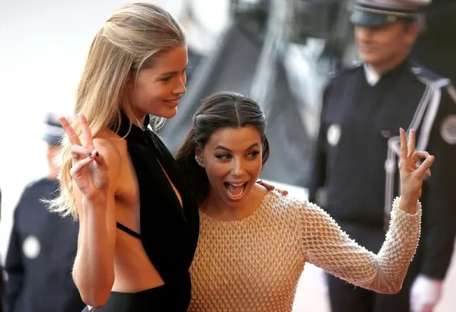 Model Doutzen Kroes and american actress Eva Longoria attend the “Cafe Society” premiere and the Opening Night Gala during the 69th annual Cannes Film Festival at the Palais des Festivals on May 11, 2016 in Cannes, France. (Photo by Tristan Fewings/Getty Images)