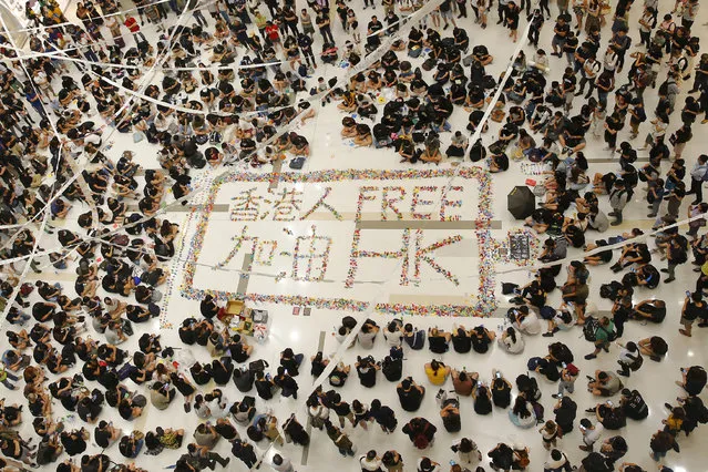 Protesters take part in a rally accusing the police of using excessive force in Hong Kong, China, 02 October 2019. A form five student was reportedly shot by police during clashes on 01 October 2019. Hong Kong has witnessed several months of ongoing mass protests, originally triggered by a now withdrawn extradition bill to mainland China that have turned into a wider pro-democracy movement. (Photo by Fazry Ismail/EPA/EFE)